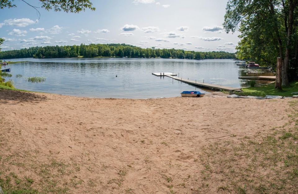 The private beach and dock on Moore Lake (1)